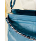 Dámska elegantná modrá prešívana kabelka s remienkom OXI