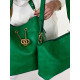Dámska zelená kabelka s kapsičkou