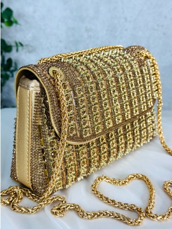Luxusná zlatá spoločenská kabelka s ozodbnými kamienkami