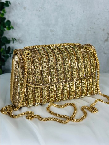 Luxusná zlatá spoločenská kabelka s ozodbnými kamienkami