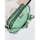 Zelená dámska kabelka s mašľou a remienkom