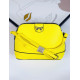 Žltá dámska kabelka s mašľou a remienkom